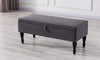 This upholstered bench serves as storage as well as a design element in your home