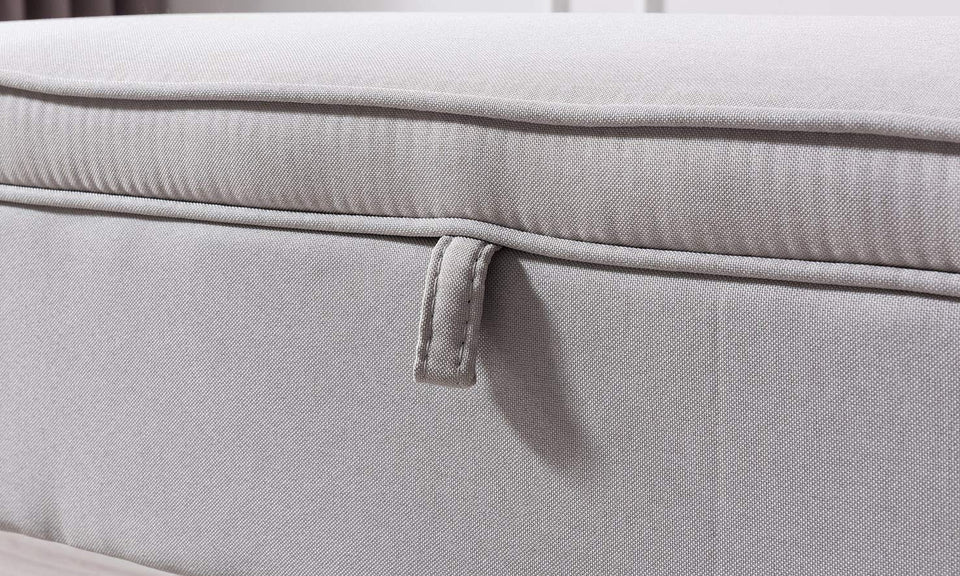 This upholstered bench serves as storage as well as a design element in your home